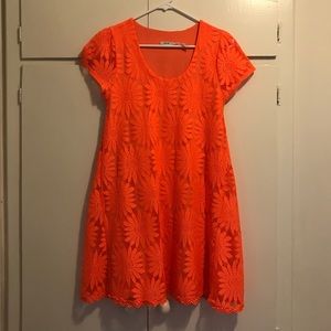 Bright orange daisy dress cute!